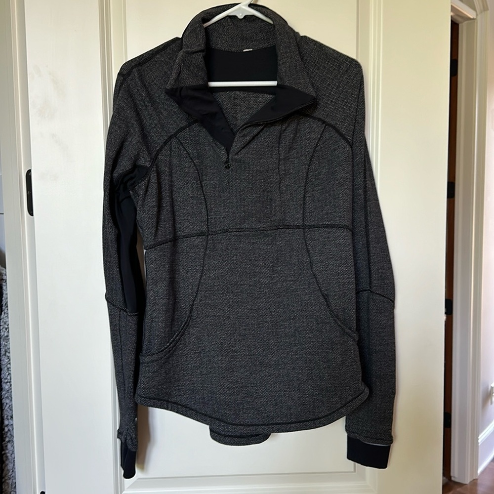 Asymmetrical 1/4 zip with kangaroo pocket and thumb holes